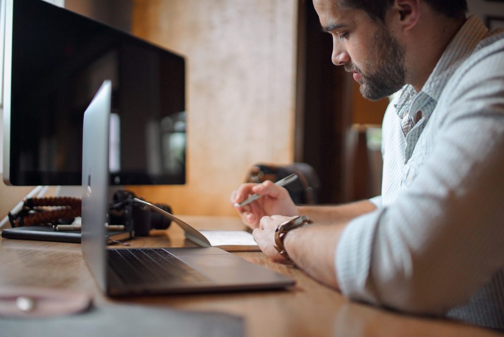 Illustrative photo showing man writing